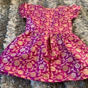 Metallic fuchsia and gold dress.